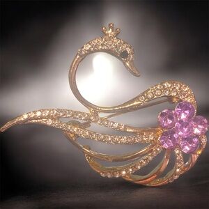 Elegant Gold Swan Brooch with Pink Accents